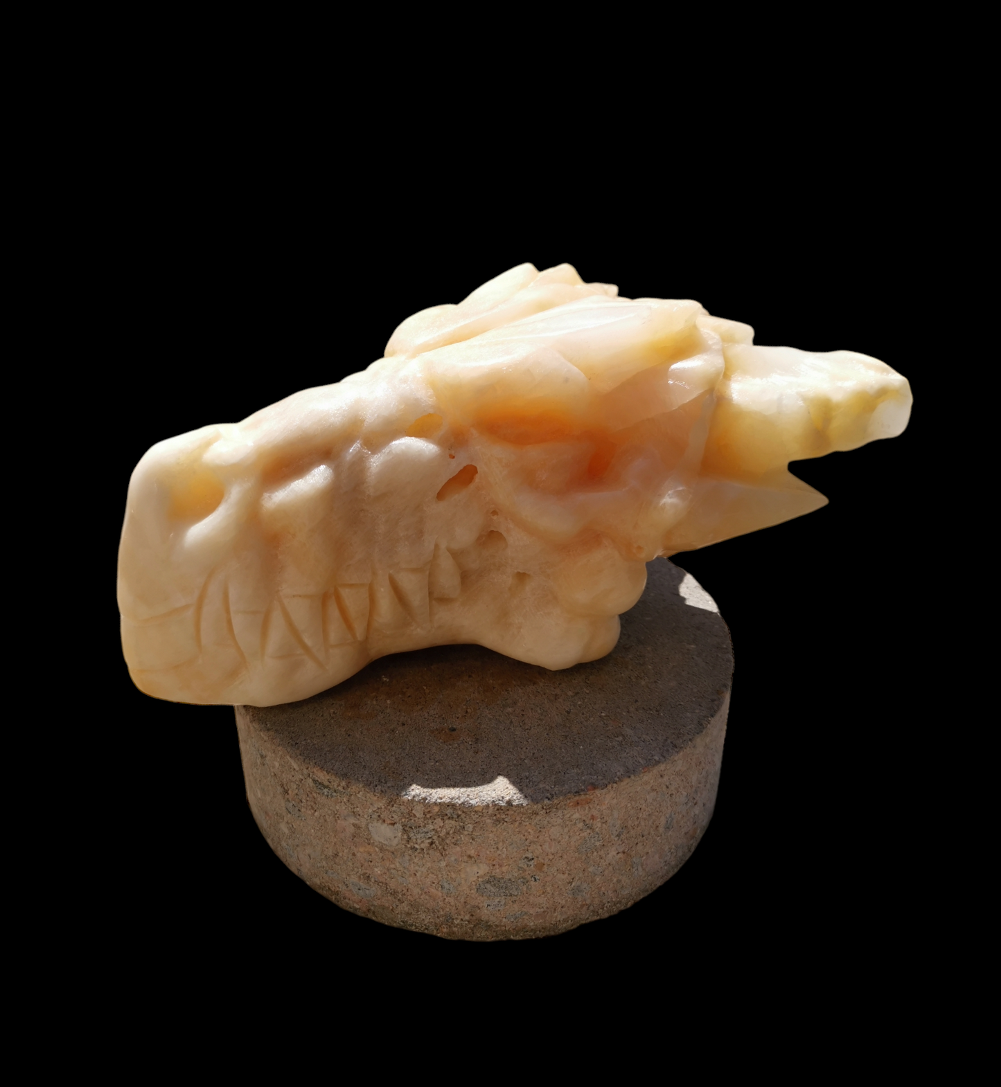 Drakskalle i orange kalcit